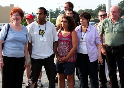 Charlie Utermohle outside with a group of volunteers